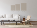 Size guide mockup in a neutral living room showing wall art dimensions 16×20, 18×24, and 22×28 inches above a sofa for scale.